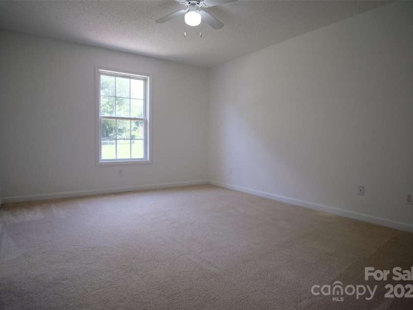 318 Huffman Road, Gastonia, NC 28056.  MLS# CAR4297104, YatesRealty ID 22875. Primary bedroom
