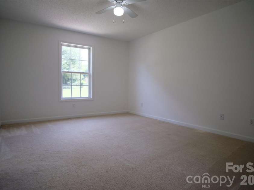 318 Huffman Road, Gastonia, NC 28056.  MLS# CAR4297104, YatesRealty ID 22875. Primary bedroom