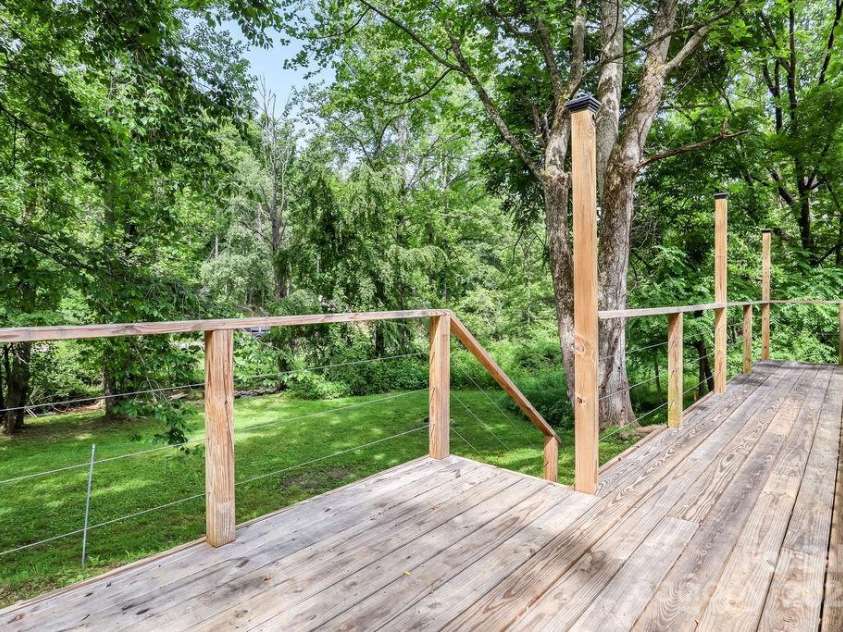 57 Fair Hollow Lane, Hendersonville, NC 28792.  MLS# CAR4268664, YatesRealty ID 22877. Back deck of Office