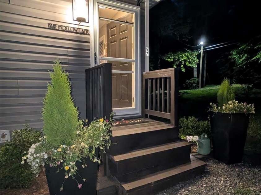 57 Fair Hollow Lane, Hendersonville, NC 28792.  MLS# CAR4268664, YatesRealty ID 22877. Night time front