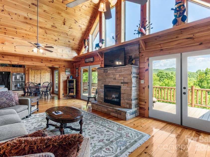 26 Upper Ridge Road, Black Mountain, NC 28711.  MLS# CAR4274378, YatesRealty ID 22879. Living room with expansive views.