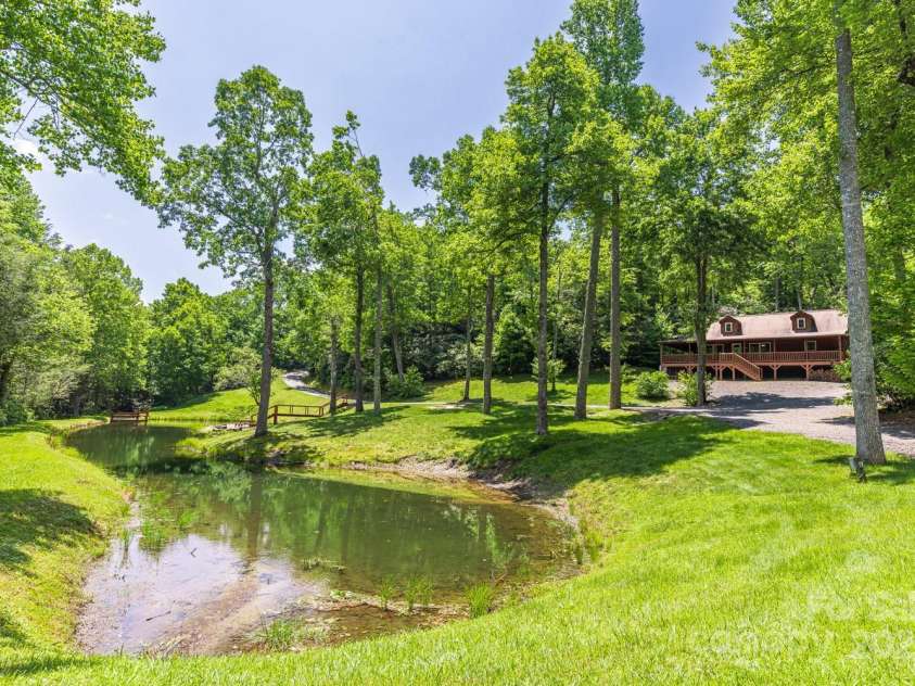 26 Upper Ridge Road, Black Mountain, NC 28711.  MLS# CAR4274378, YatesRealty ID 22879. Pond access