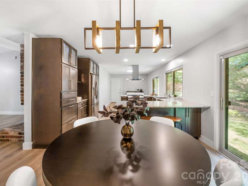 135 Scarlet Drive, Fletcher, NC 28732.  MLS# CAR4373929, YatesRealty ID 22883. Dining area opens to kitchen. 