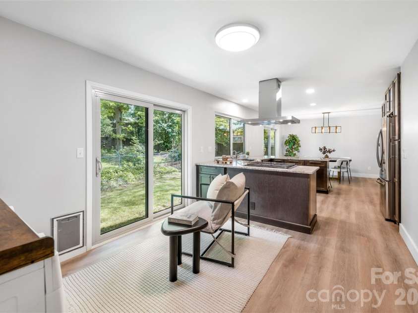 135 Scarlet Drive, Fletcher, NC 28732.  MLS# CAR4373929, YatesRealty ID 22883. There are double sliding doors in the kitchen / dining areas. 