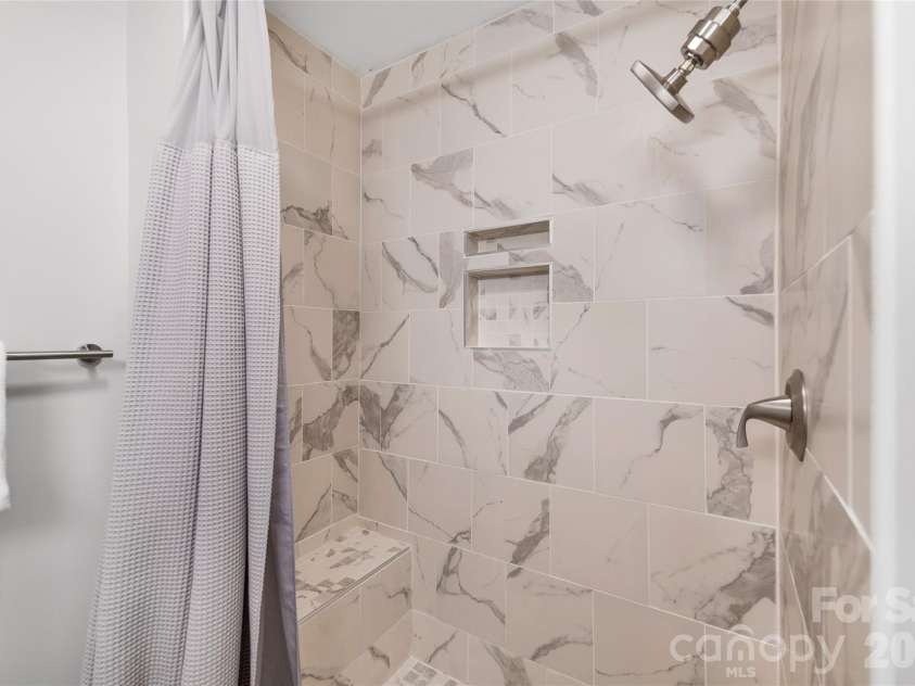 135 Scarlet Drive, Fletcher, NC 28732.  MLS# CAR4373929, YatesRealty ID 22883. Tiled shower. 