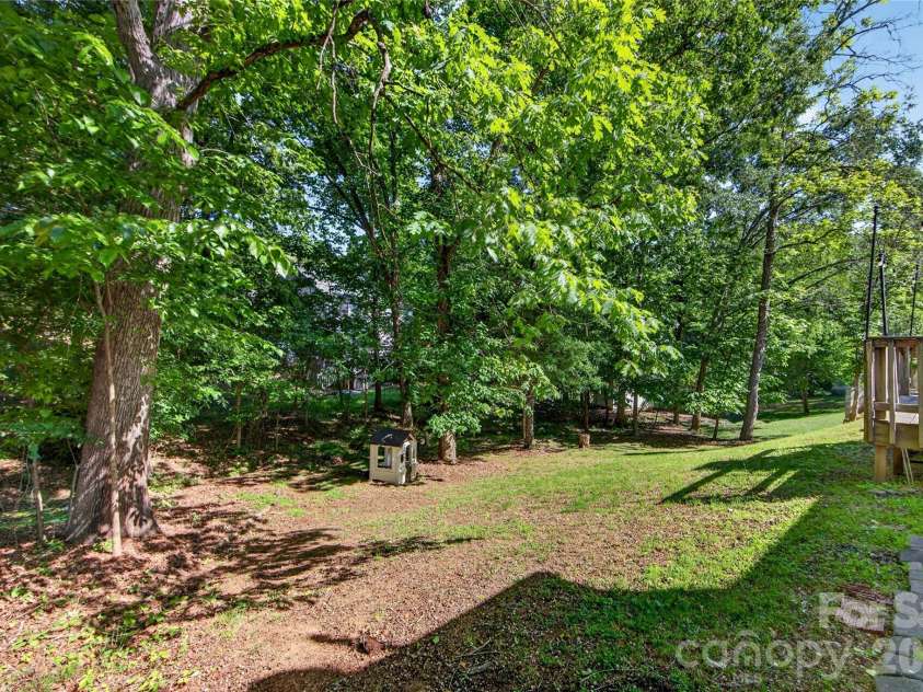 8713 Golf Ridge Drive, Charlotte, NC 28277.  MLS# CAR4380482, YatesRealty ID 22884. Backyard