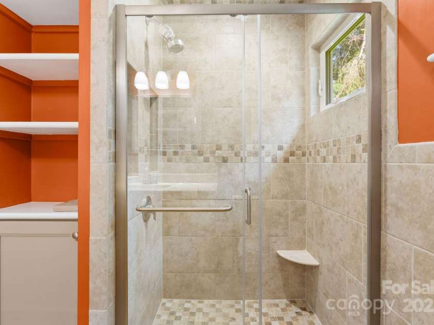 115 Aurora Drive, Asheville, NC 28805.  MLS# CAR4273830, YatesRealty ID 22887. Primary bathroom