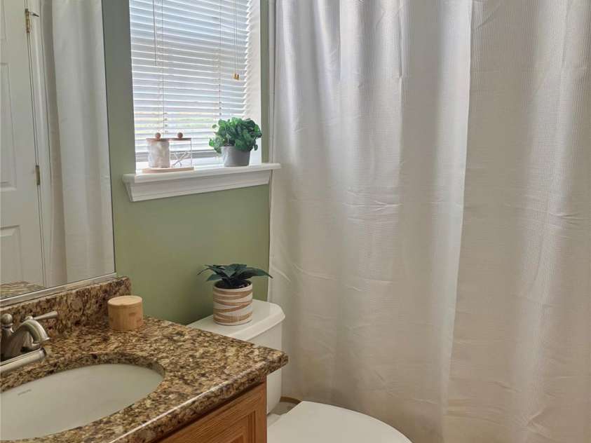 5367 Harvest Hill Drive, Harrisburg, NC 28075.  MLS# CAR4362379, YatesRealty ID 22892. Connected to Main Level Bedroom