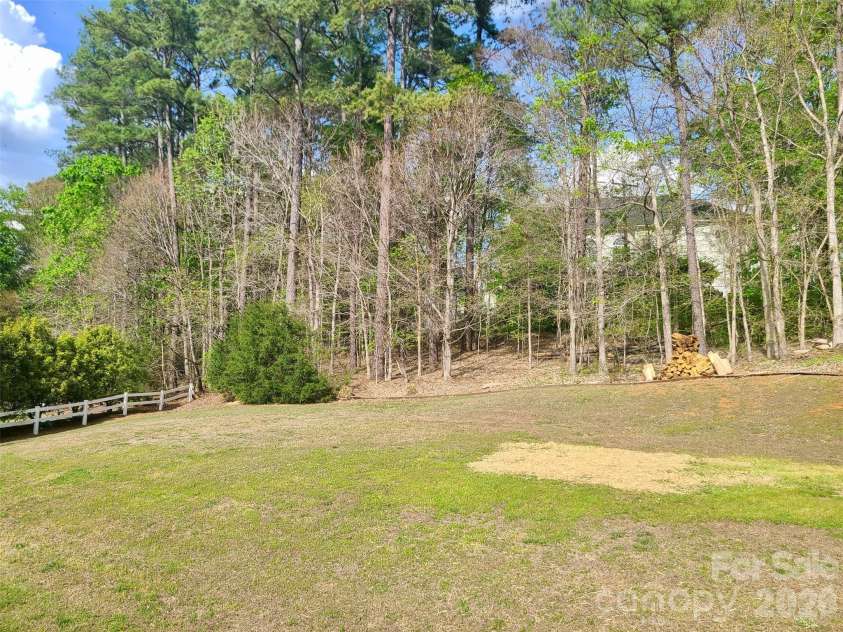 5367 Harvest Hill Drive, Harrisburg, NC 28075.  MLS# CAR4362379, YatesRealty ID 22892. Large Backyard