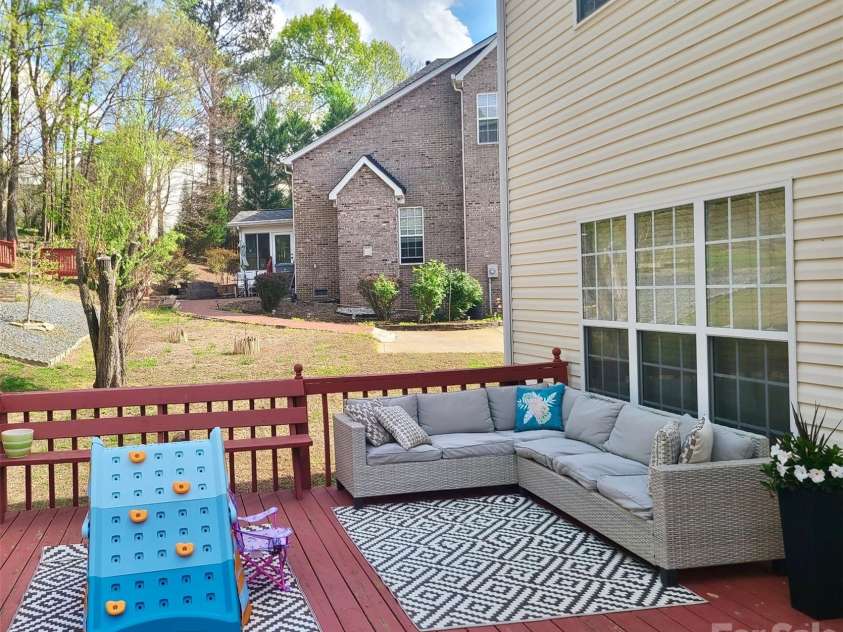 5367 Harvest Hill Drive, Harrisburg, NC 28075.  MLS# CAR4362379, YatesRealty ID 22892. Oversized Deck