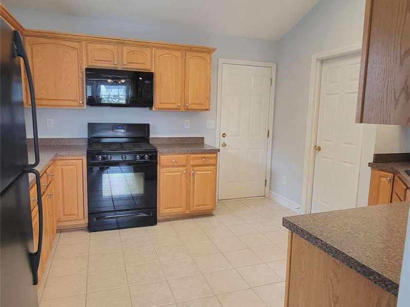 3327 Flagler Circle, Midland, NC 28107.  MLS# CAR4365059, YatesRealty ID 22895. Kitchen entering from Dining area
