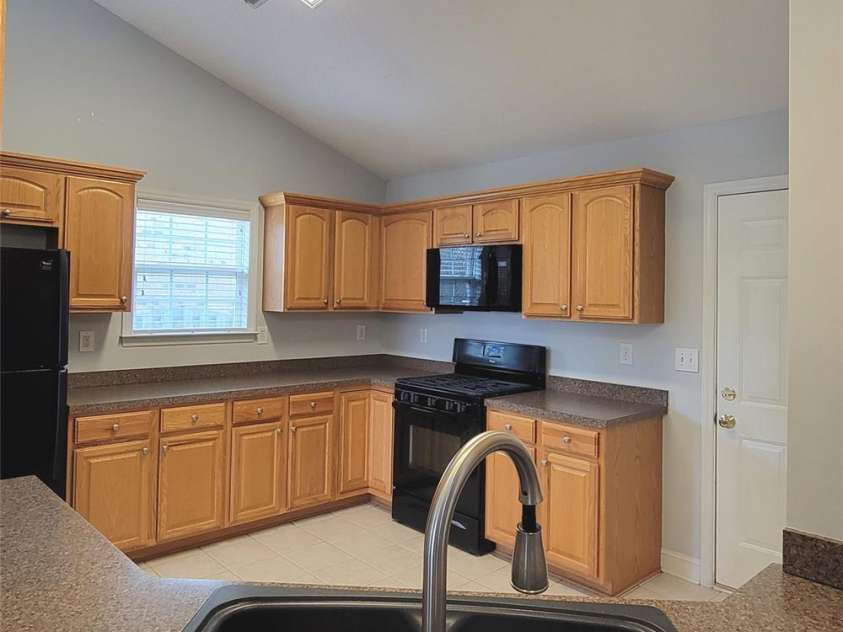 3327 Flagler Circle, Midland, NC 28107.  MLS# CAR4365059, YatesRealty ID 22895. Kitchen view from opening over sink