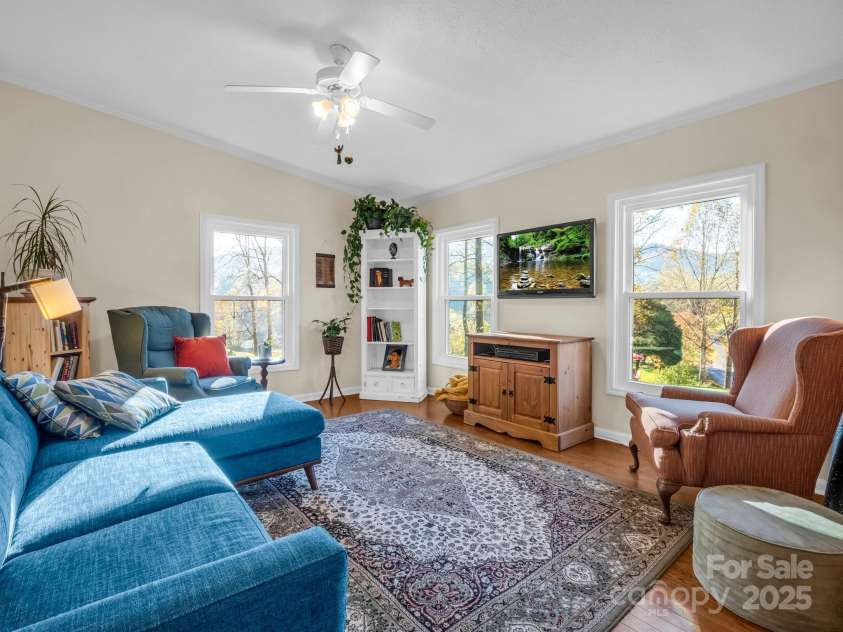 22 Shallow Branch Road, Leicester, NC 28748.  MLS# CAR4195213, YatesRealty ID 2290. 3 Bedroom currently utilized as communal space