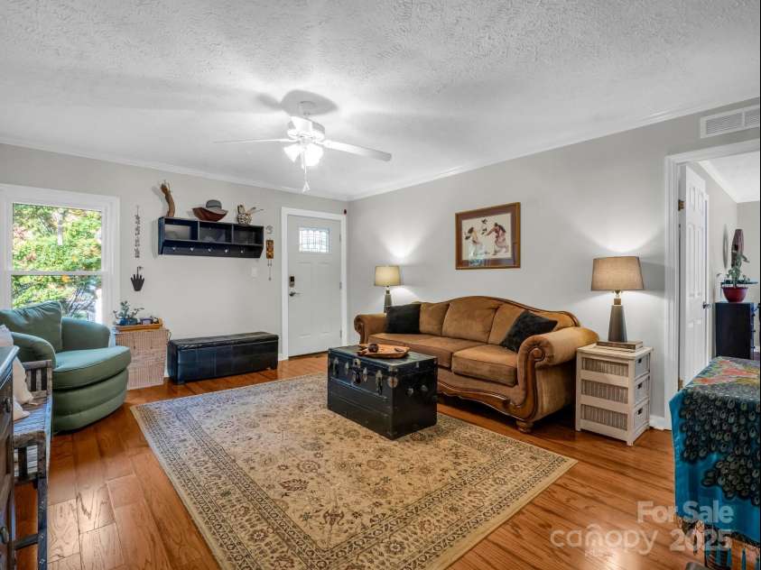 22 Shallow Branch Road, Leicester, NC 28748.  MLS# CAR4195213, YatesRealty ID 2290. Sitting Room with Exterior Exit