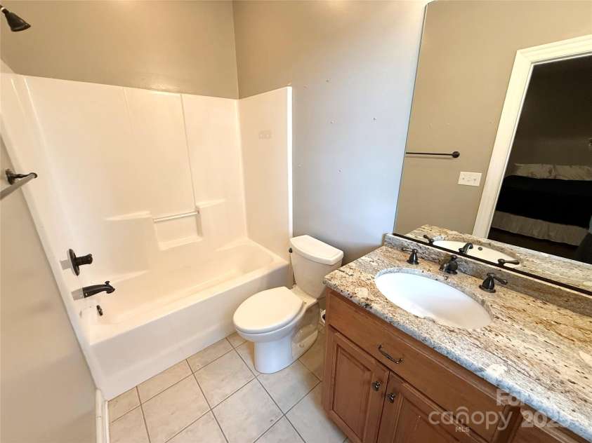 141 Weathers Creek Road, Troutman, NC 28166.  MLS# CAR4264721, YatesRealty ID 22900. Bathroom 3 on upper level.