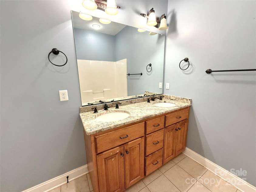 141 Weathers Creek Road, Troutman, NC 28166.  MLS# CAR4264721, YatesRealty ID 22900. Bathroom 4 on upper level.