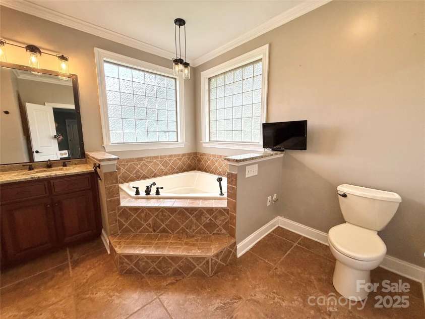 141 Weathers Creek Road, Troutman, NC 28166.  MLS# CAR4264721, YatesRealty ID 22900. Garden soaking tub in primary