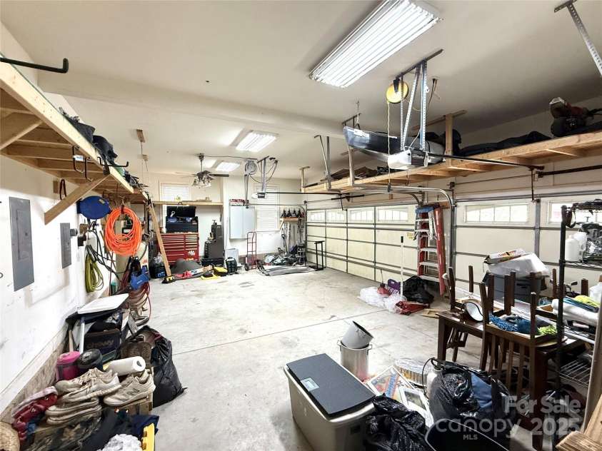 141 Weathers Creek Road, Troutman, NC 28166.  MLS# CAR4264721, YatesRealty ID 22900. Inside 3 car garage.