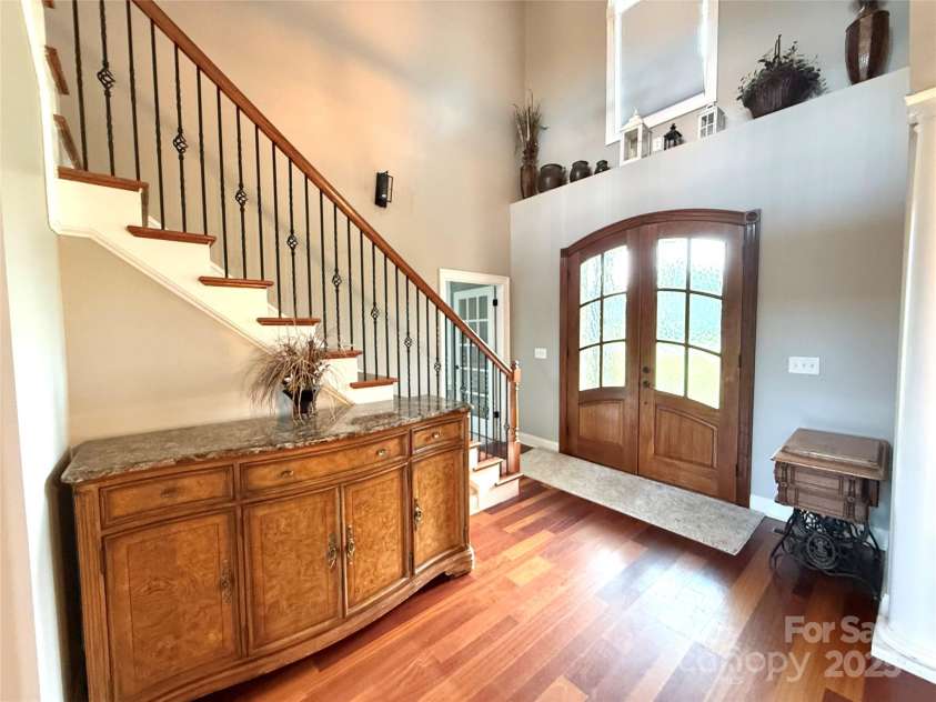 141 Weathers Creek Road, Troutman, NC 28166.  MLS# CAR4264721, YatesRealty ID 22900. Large entryway.