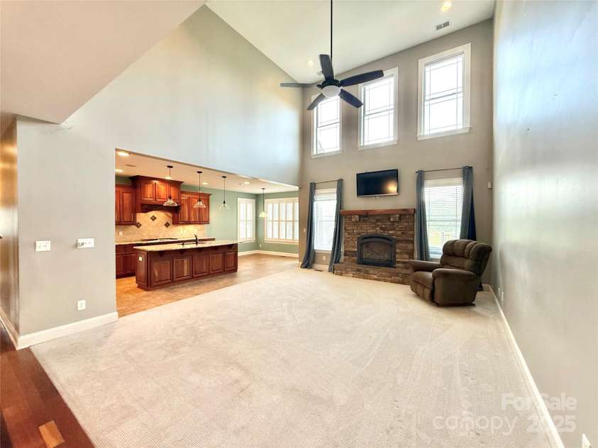 141 Weathers Creek Road, Troutman, NC 28166.  MLS# CAR4264721, YatesRealty ID 22900. Large Family Room.