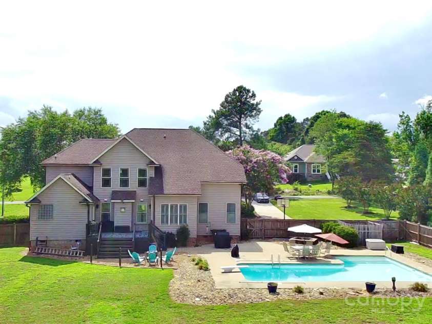 141 Weathers Creek Road, Troutman, NC 28166.  MLS# CAR4264721, YatesRealty ID 22900. Large fenced in backyard area.