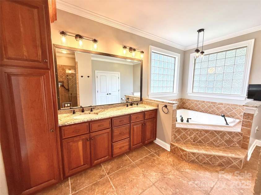 141 Weathers Creek Road, Troutman, NC 28166.  MLS# CAR4264721, YatesRealty ID 22900. Primary bathroom