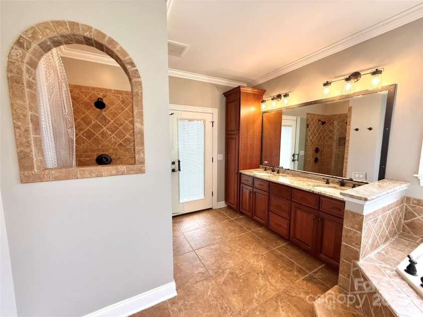 141 Weathers Creek Road, Troutman, NC 28166.  MLS# CAR4264721, YatesRealty ID 22900. Primary bathroom.