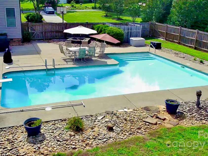 141 Weathers Creek Road, Troutman, NC 28166.  MLS# CAR4264721, YatesRealty ID 22900. Salt water pool.