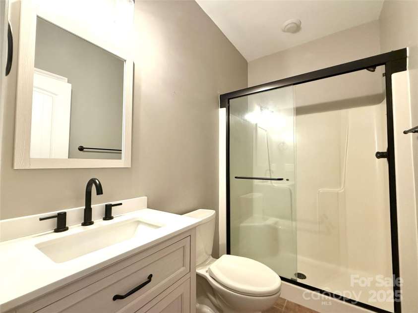 141 Weathers Creek Road, Troutman, NC 28166.  MLS# CAR4264721, YatesRealty ID 22900. Second full bath on main.