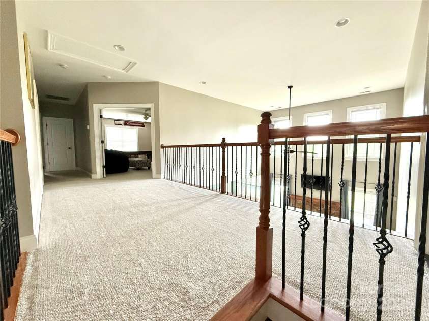 141 Weathers Creek Road, Troutman, NC 28166.  MLS# CAR4264721, YatesRealty ID 22900. Upper level walkway.