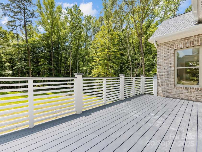 5217 Waterfall Court, Gastonia, NC 28056.  MLS# CAR4268389, YatesRealty ID 22901. Back Deck Overlooking Back Yard