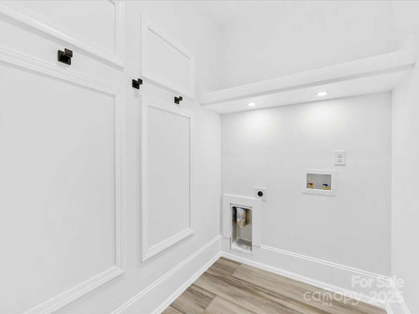 5217 Waterfall Court, Gastonia, NC 28056.  MLS# CAR4268389, YatesRealty ID 22901. Second Floor Laundry Room