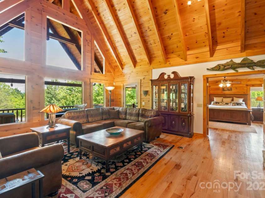 165 Perennial Drive, Nebo, NC 28761.  MLS# CAR4252202, YatesRealty ID 22902. French doors leading to primary bedroom