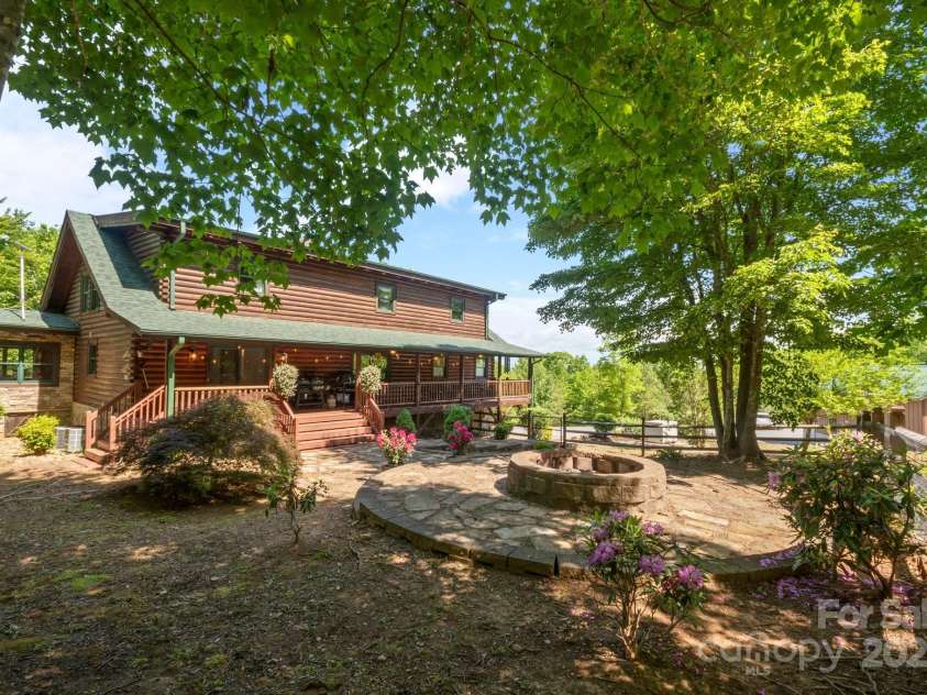 165 Perennial Drive, Nebo, NC 28761.  MLS# CAR4252202, YatesRealty ID 22902. View of back of the house