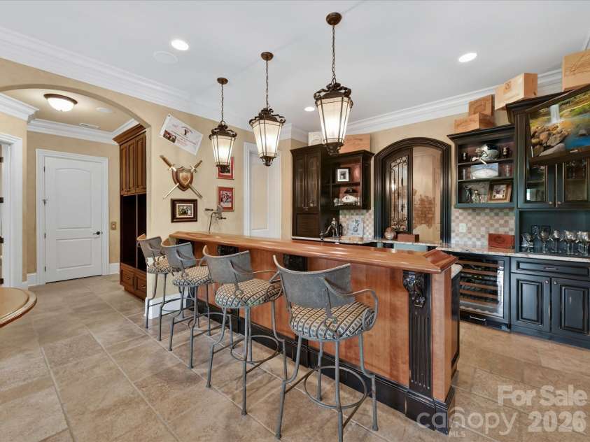 14633 Rudolph Dadey Drive, Charlotte, NC 28277.  MLS# CAR4380661, YatesRealty ID 22910. Full kitchen with Range, sink, D/W, mini fridge