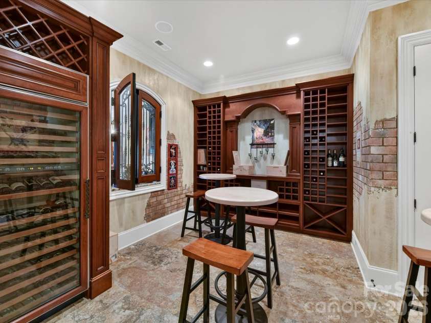 14633 Rudolph Dadey Drive, Charlotte, NC 28277.  MLS# CAR4380661, YatesRealty ID 22910. Full size SubZero wine refrigerator