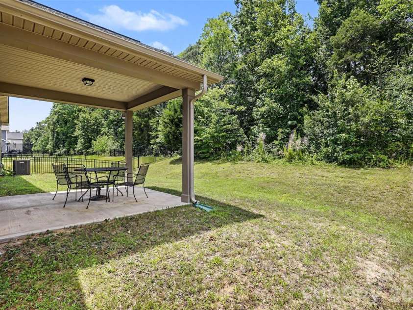 1405 Calder Drive, Indian Trail, NC 28079.  MLS# CAR4401073, YatesRealty ID 22917. Backyard and patio