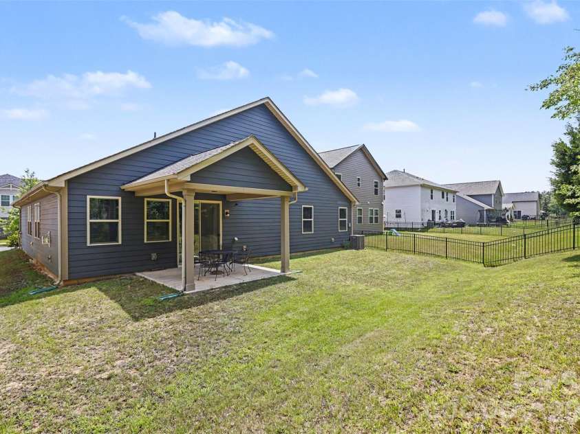 1405 Calder Drive, Indian Trail, NC 28079.  MLS# CAR4401073, YatesRealty ID 22917. Backyard and patio