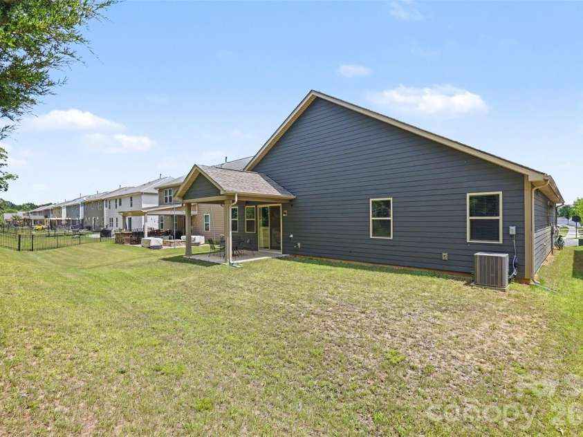 1405 Calder Drive, Indian Trail, NC 28079.  MLS# CAR4401073, YatesRealty ID 22917. Backyard and patio