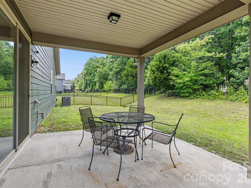 1405 Calder Drive, Indian Trail, NC 28079.  MLS# CAR4401073, YatesRealty ID 22917. Covered back patio