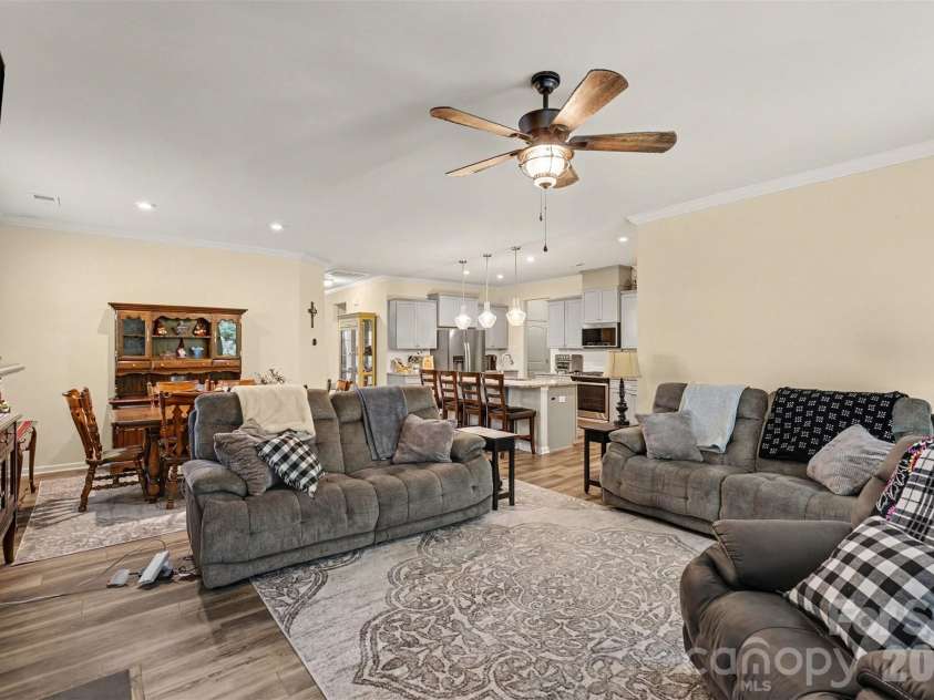 1405 Calder Drive, Indian Trail, NC 28079.  MLS# CAR4401073, YatesRealty ID 22917. Living Room into dining and kitchen
