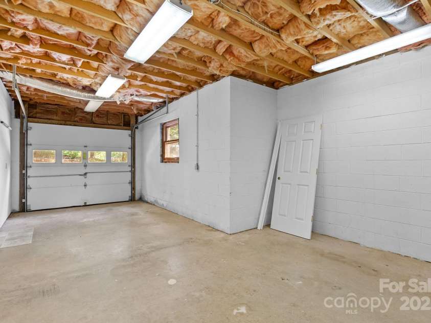 304 La Foret Drive, Morganton, NC 28655.  MLS# CAR4256952, YatesRealty ID 22917. Basement Garage