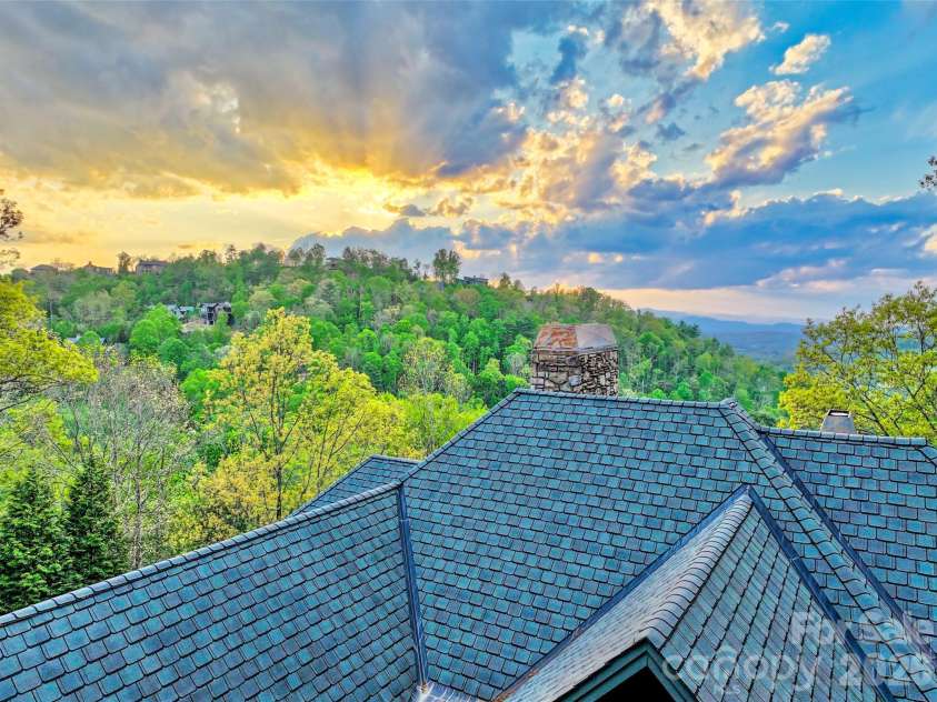 8 Timberwolf Court, Asheville, NC 28804.  MLS# CAR4369628, YatesRealty ID 22918. Drone view. The view is different every day!
