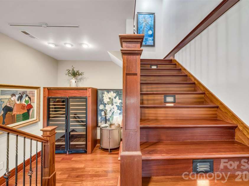 8 Timberwolf Court, Asheville, NC 28804.  MLS# CAR4369628, YatesRealty ID 22918. Staircase down