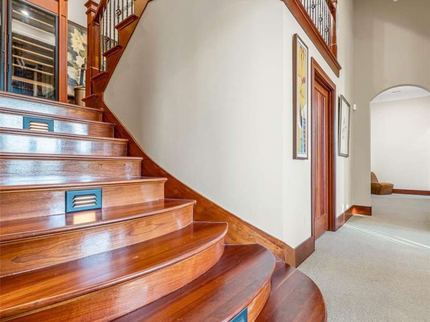 8 Timberwolf Court, Asheville, NC 28804.  MLS# CAR4369628, YatesRealty ID 22918. Staircase down