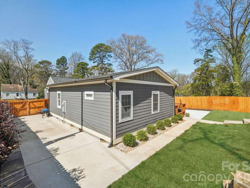 1821 Garibaldi Avenue, Charlotte, NC 28208.  MLS# CAR4354837, YatesRealty ID 22920. Extra concrete pad
