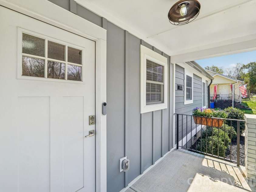 1821 Garibaldi Avenue, Charlotte, NC 28208.  MLS# CAR4354837, YatesRealty ID 22920. Front porch