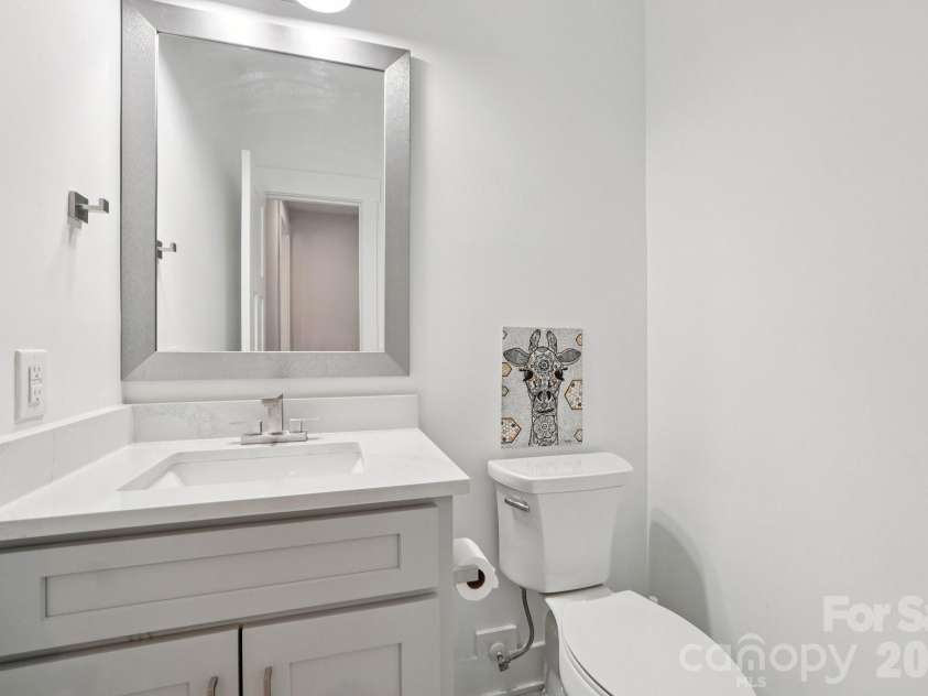 1821 Garibaldi Avenue, Charlotte, NC 28208.  MLS# CAR4354837, YatesRealty ID 22920. Half bath