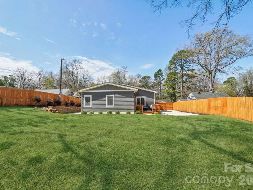 1821 Garibaldi Avenue, Charlotte, NC 28208.  MLS# CAR4354837, YatesRealty ID 22920. Large backyard
