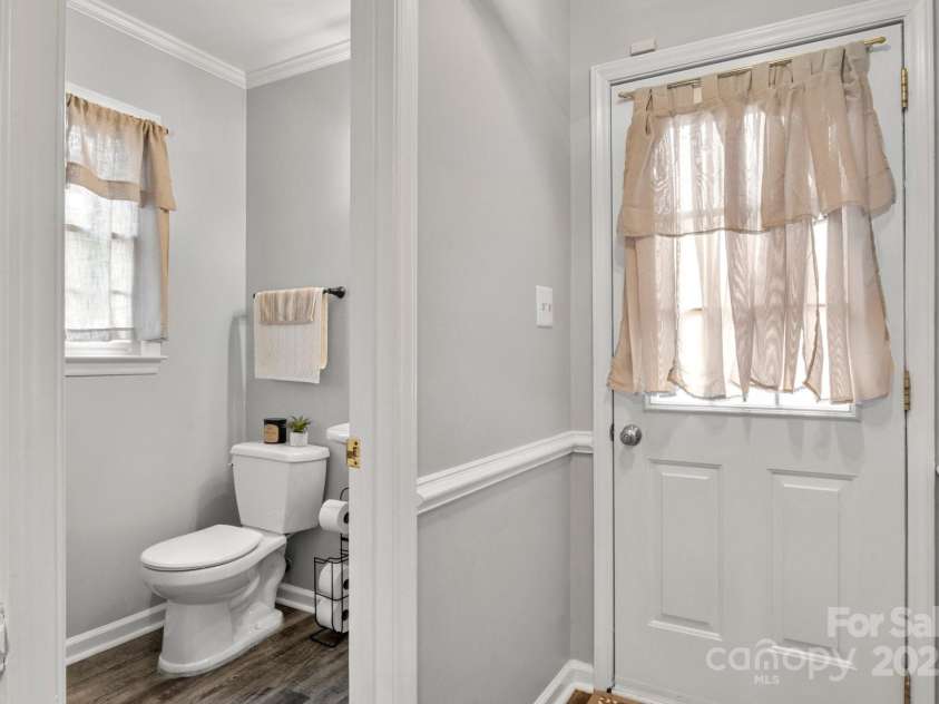 8819 Kishorn Court, Charlotte, NC 28215.  MLS# CAR4251136, YatesRealty ID 22920. Half Bathroom